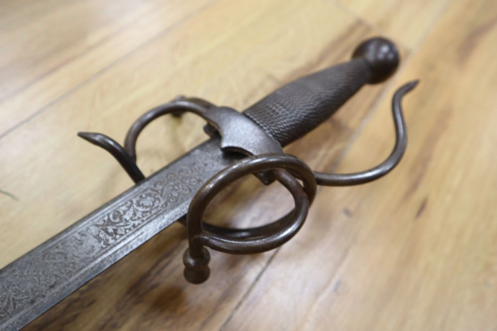 A Spanish Toledo short sword, with etched 58cm double-edged blade